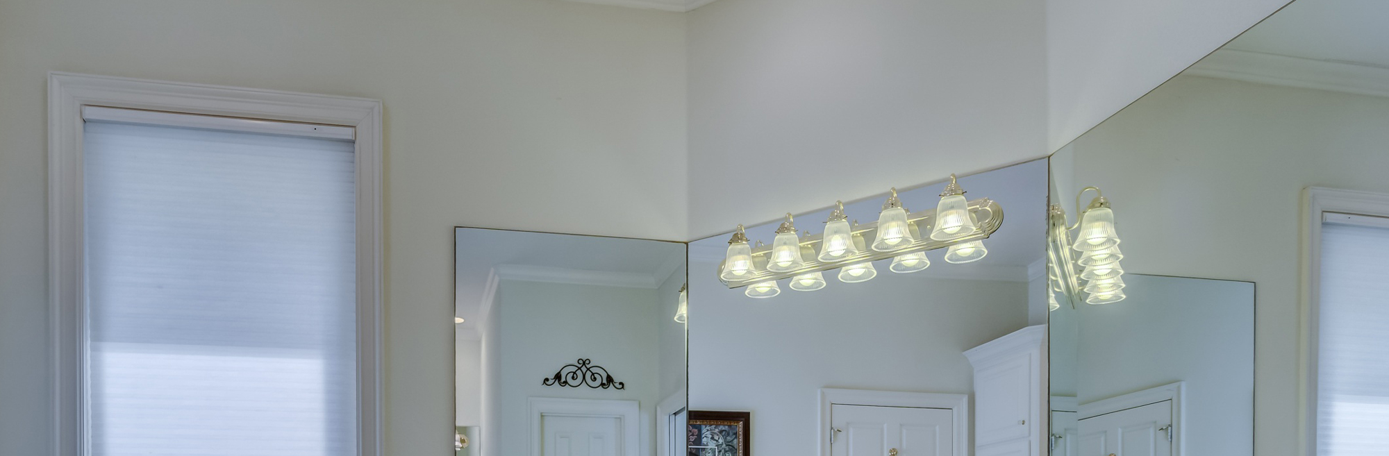 track lighting on a bathroom mirror