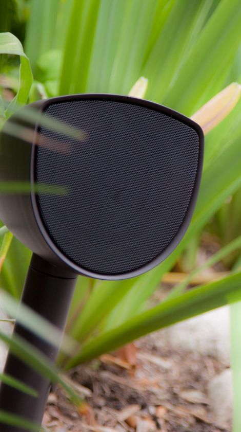 Origin speaker close up in yard, outdoor audio